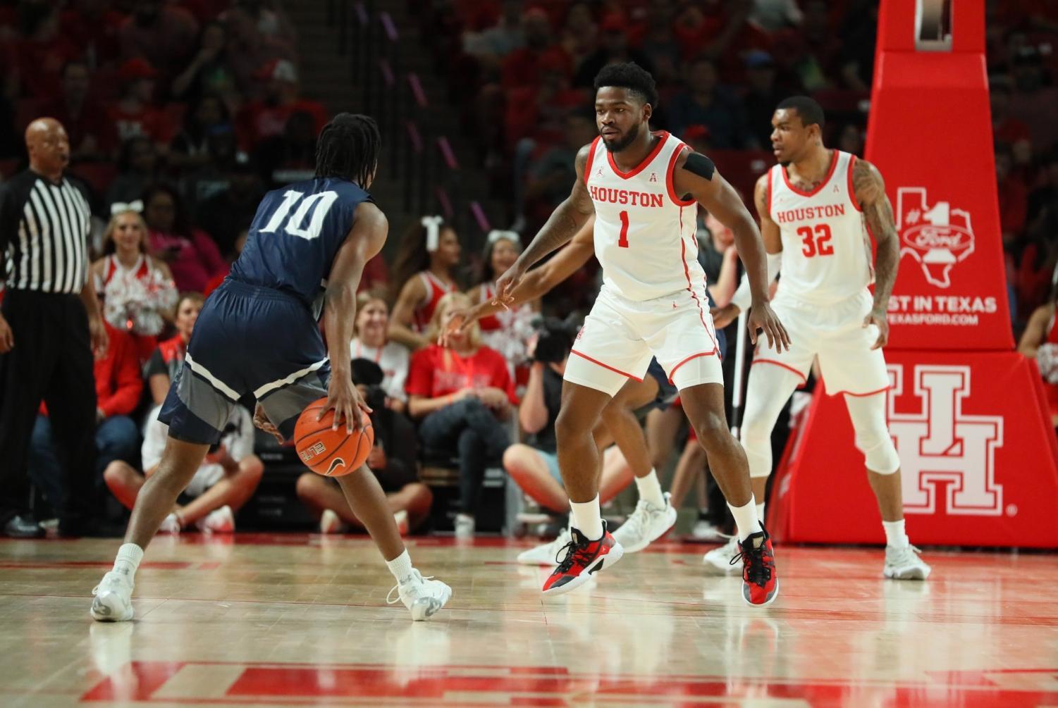 Jarius Hicklen works his way down the court