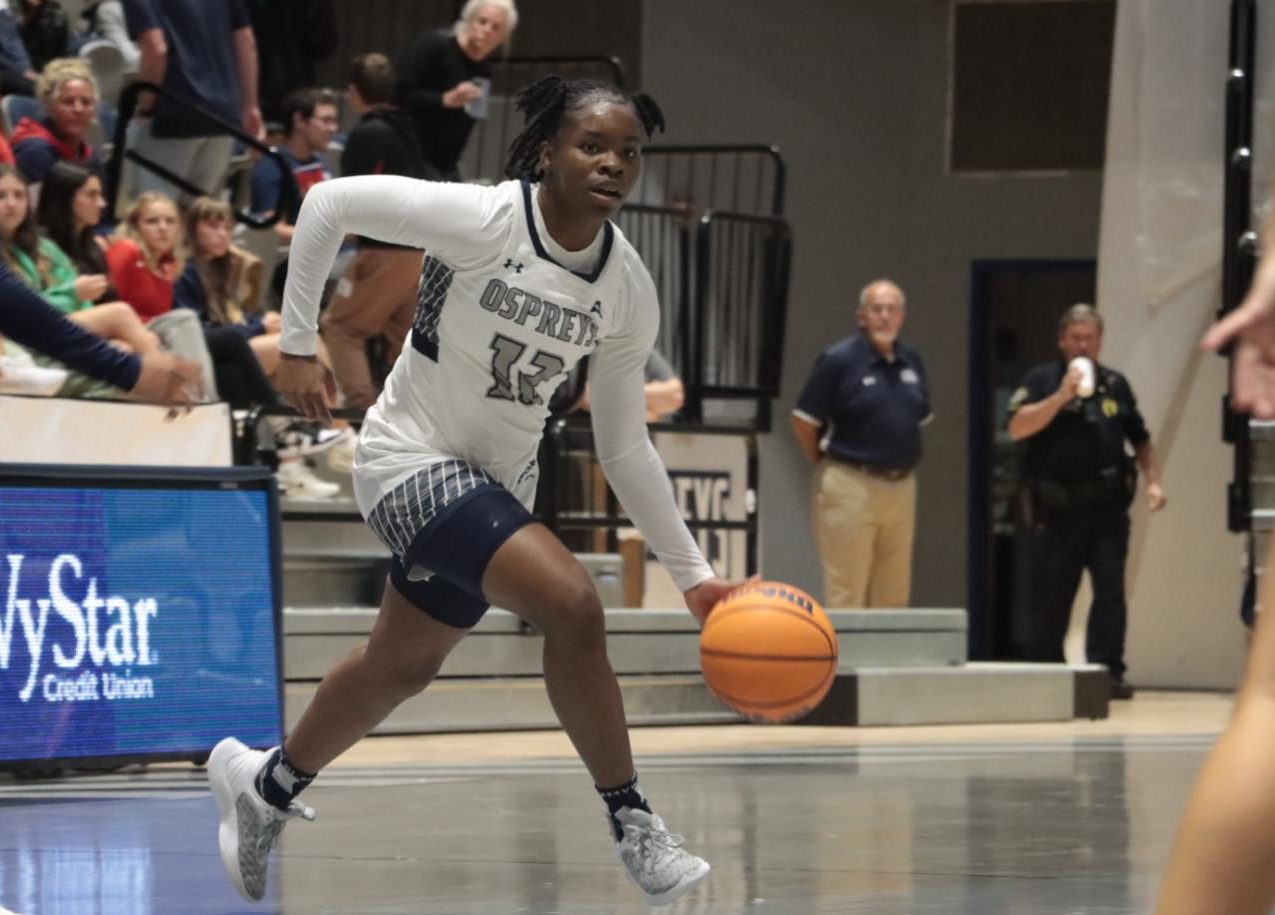 Kaila Rougier dribbles the ball