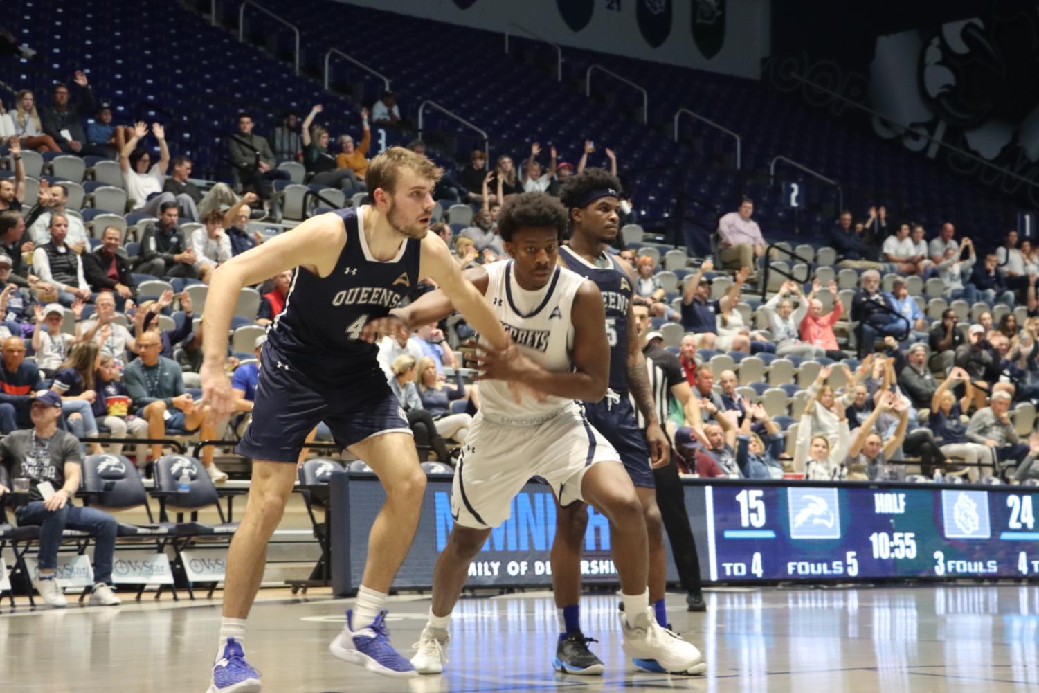 Players jostle for a rebound