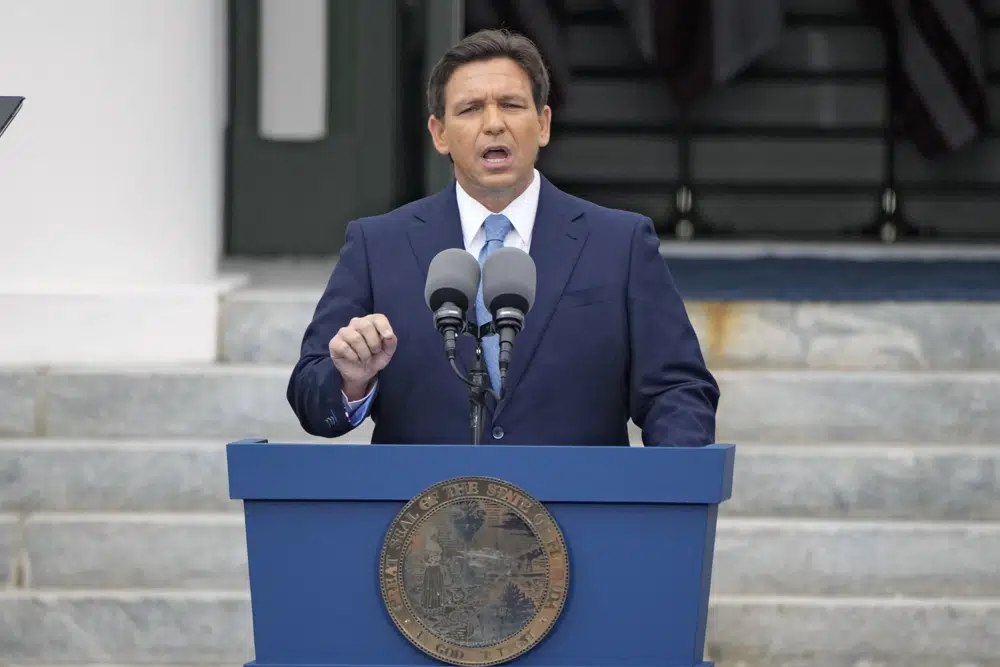 Florida Gov. Ron DeSantis speaks to the crowd after being sworn in to begin his second term during an inauguration ceremony outside the Old Capitol Tuesday, Jan. 3, 2023, in Tallahassee, Fla. (AP Photo/Lynne Sladky)