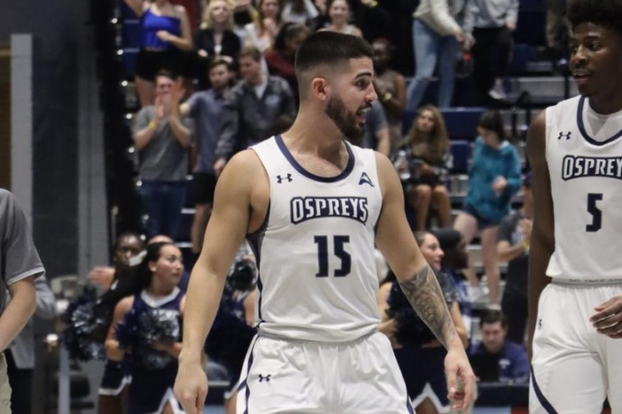 Jose Placer celebrates a win with his team