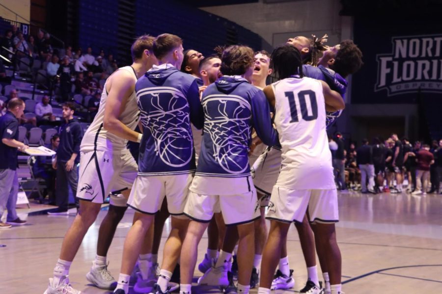 The UNF Men's Basketball team huddles before taking on Eastern Kentucky on Feb. 22, 2023 at UNF Arena in Jacksonville, Florida.