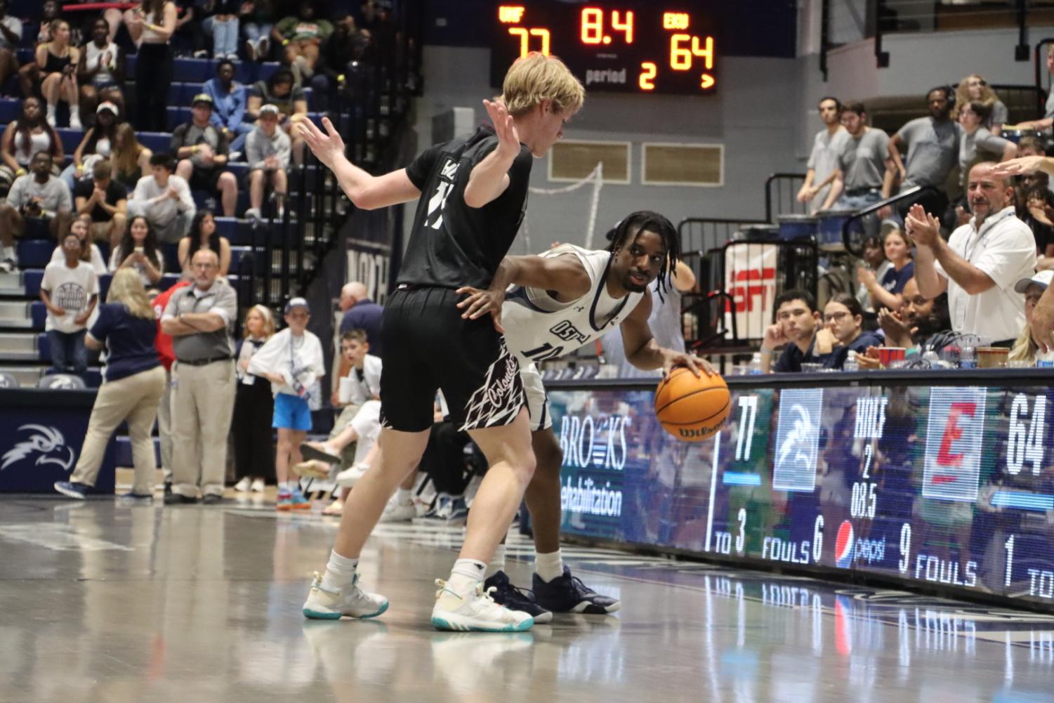 Jarius Hicklen works his way around an EKU defender.