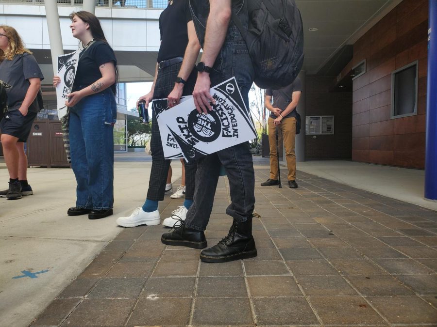 Bringing signs and loud voices, University of North Florida students participated in a Florida-wide walkout Thursday afternoon. 