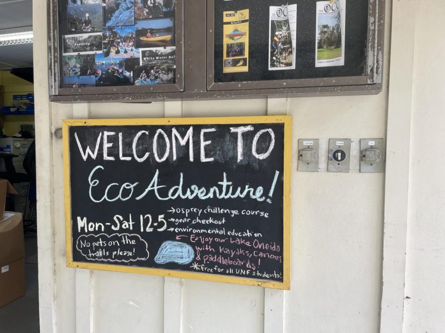 A sign by UNF's Eco Adventure pavilion by Lot 54.