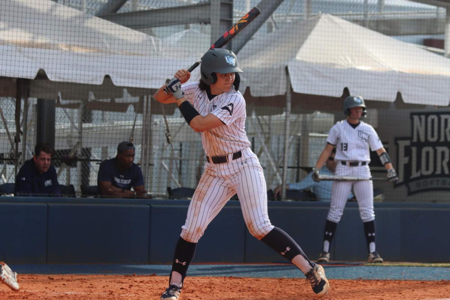 Softball player batting