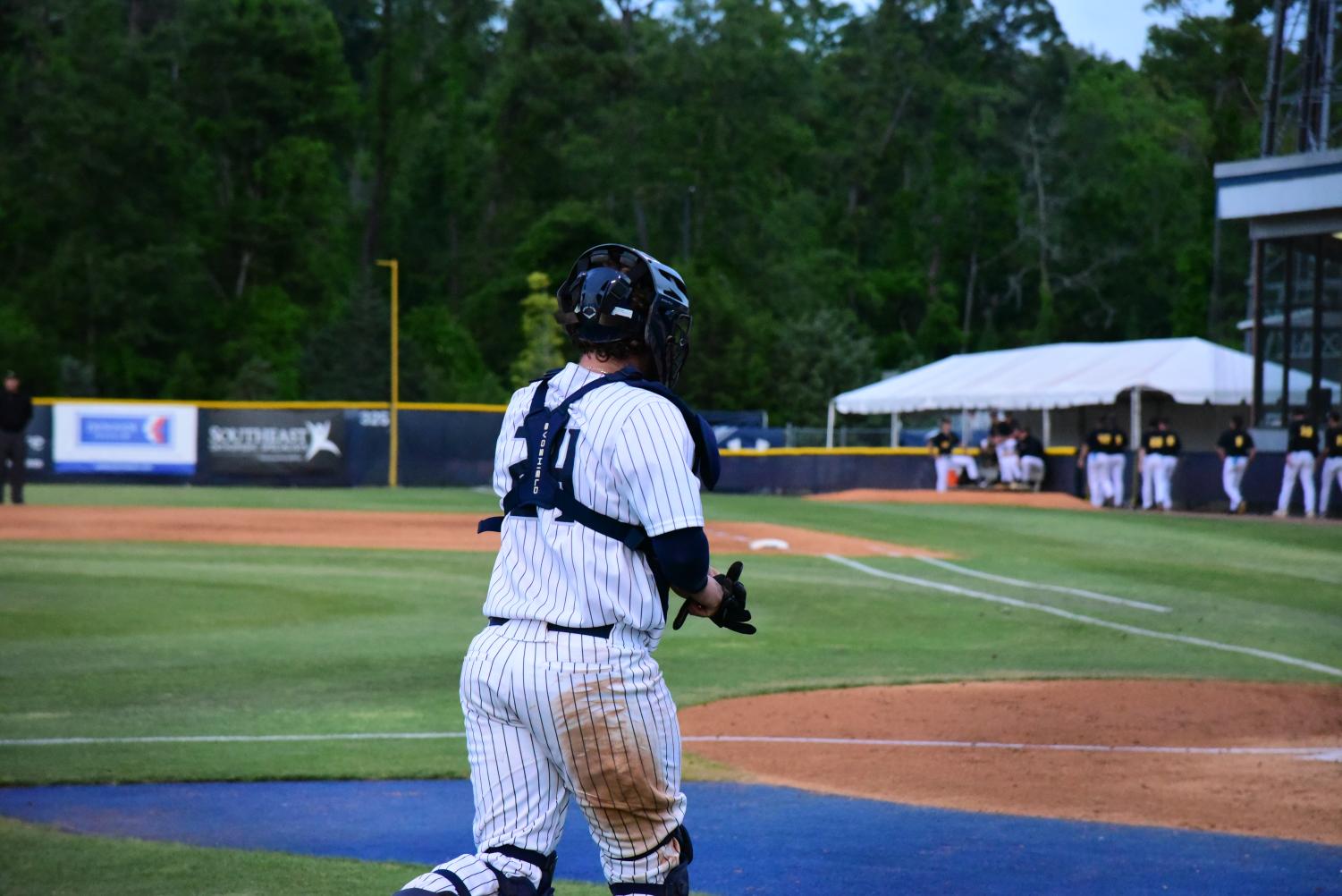 Dallen Leach jogs onto the field