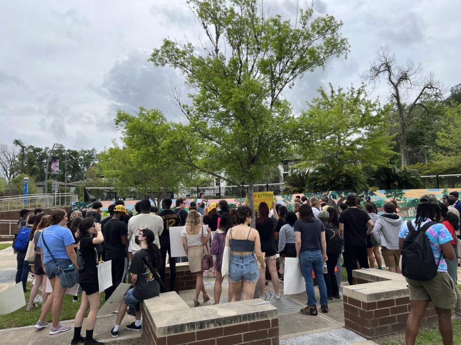 Before marching across Florida A&M University's campus, protesters heard from speakers. 