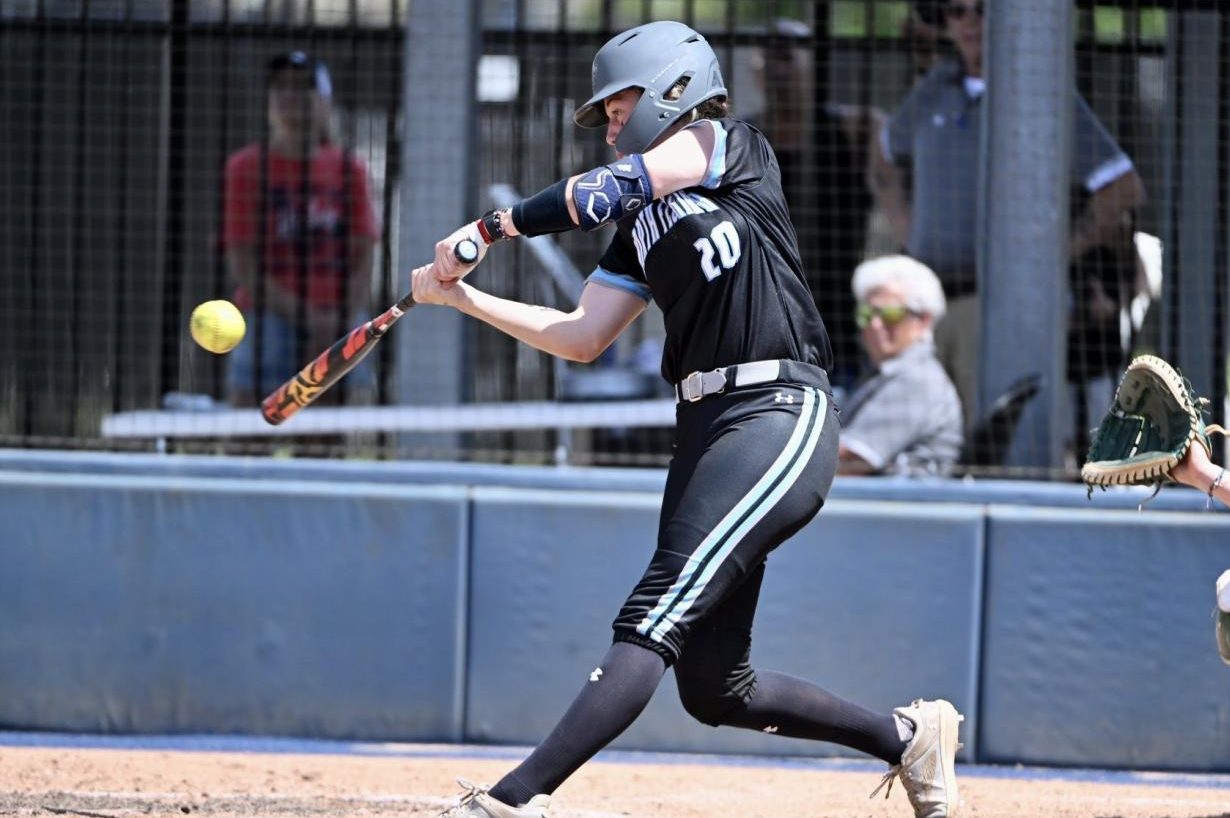 Mackenzie Woods hitting the ball