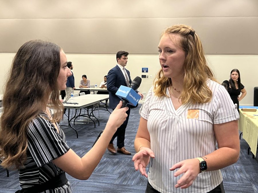Student body vice presidential candidate Emily Sullivan (right) talks with Spinnaker Government Reporter Marissa Cannegieter (left) about her initiatives once elected.
