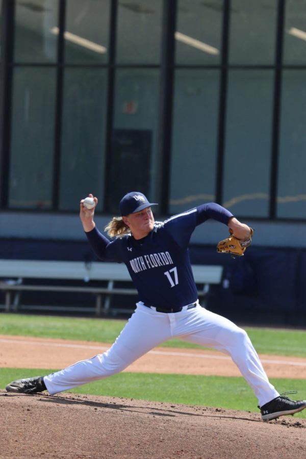 UNF Mens Baseball Pitcher Clayton Boroski #17 getting ready to throw a pitch at Stetson batter on March 26th, 2023 at Harmon Stadium in Jacksonville, Florida.