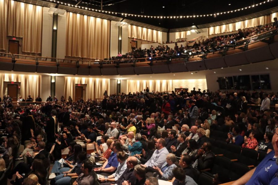 Full auditorium of people
