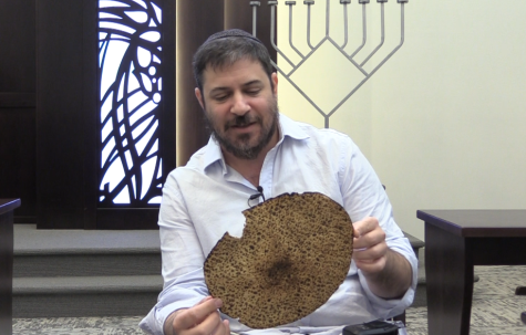 Rabbi Novack holds a schmura matza during an interview with Spinnaker. This particular matza, he said, was made in Ukraine.