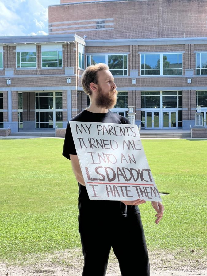 An unidentified preacher holds a sign during the first week of the Fall 2022 semester.