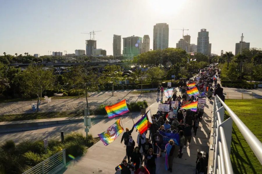 FILE - Marchers make their way toward the St. Pete Pier in St. Petersburg, Fla., on March 12, 2022, during a march to protest the controversial Dont say gay bill passed by Floridas Republican-led legislature. For many of those who live in Florida, recent months in 2023 have brought some changes — many linked to Gov. Ron DeSantis. (Martha Asencio-Rhine/Tampa Bay Times via AP, File)