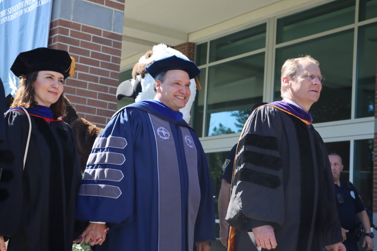 University of North Florida President Moez Limayem (center), Dr. Alya Limayem (left) and Board of Trustees Chair Kevin Hyde (right) at President Limayem’s inauguration on April 14, 2023.