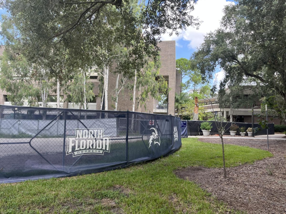An area behind the UNF Library has been fenced off to serve as a staging area for construction.