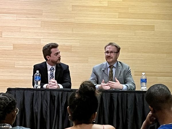 Professors Sean Freeder and Seth Warner discussed free speech and affirmative action with students and fellow professors on Sept. 20.