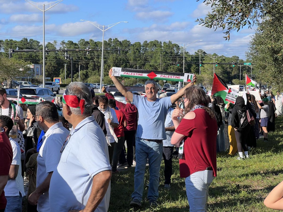Protesters marched down up and down Town Center Parkway on Saturday in a march for Palestine.