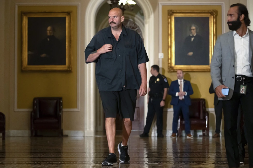 Sen. John Fetterman, D-Pa., walks on Capitol Hill on Thursday, Sept. 21, 2023, in Washington. (AP Photo/Mark Schiefelbein)