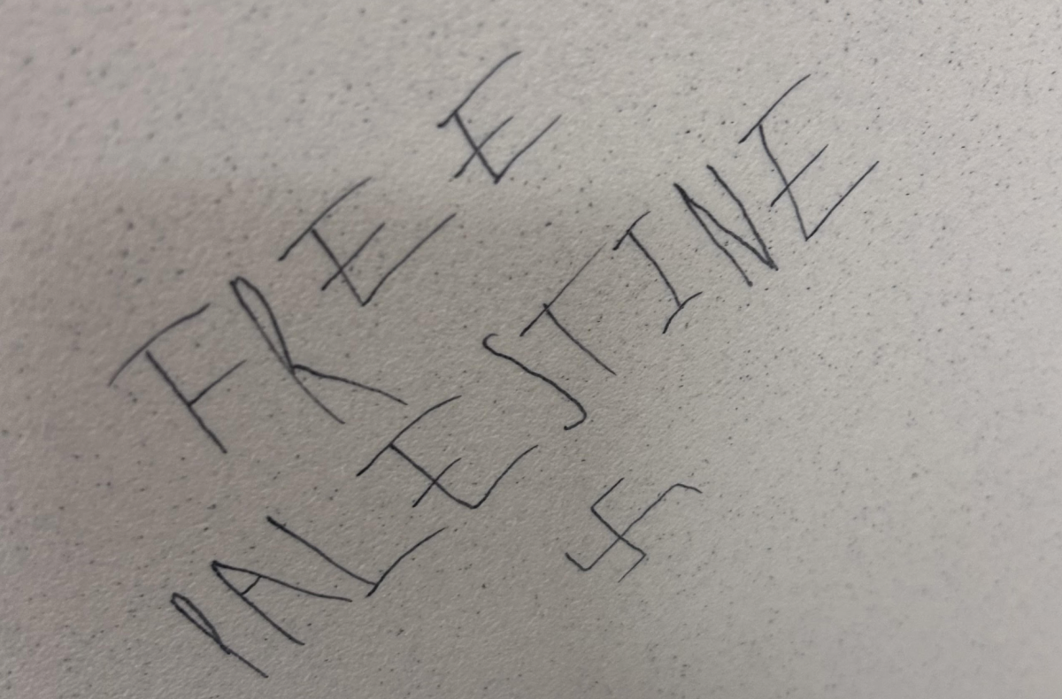 First swastika drawing in the Building 51 womens bathroom (Photo courtesy of Hailey Jacobsen)