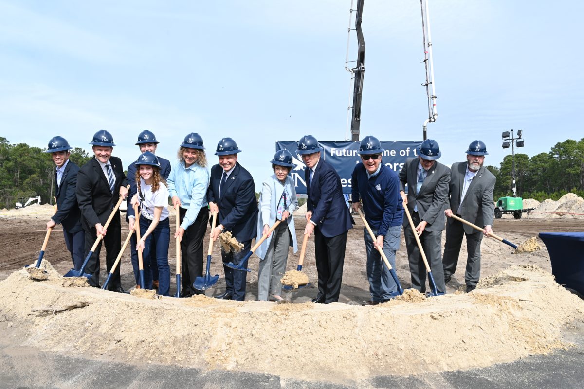 UNF President Moez Limayem at the groundbreaking event along with members of the UNF Board of Trustees and other figures in the campus community (Photo courtesy of UNF)