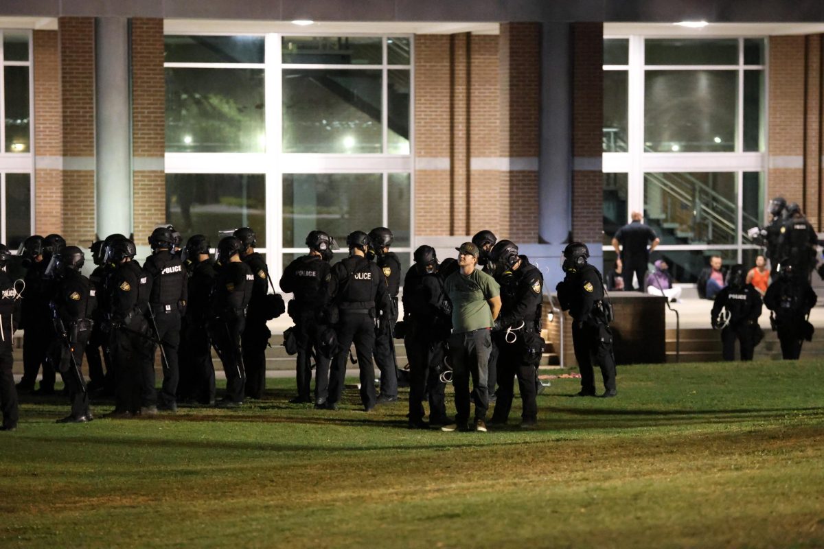 Officers arrested protesters one by one. 