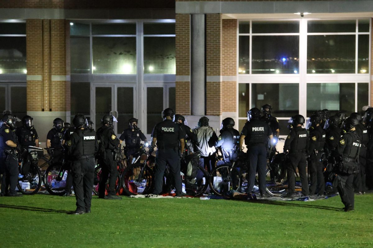 Officers arrested protesters one by one.