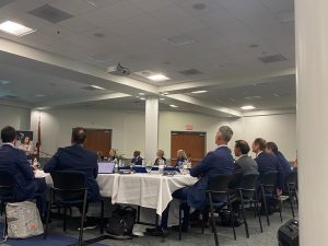 Trustees sit at around the table for their quarterly meeting at UNF Mednexus on Sept. 30, 2024.