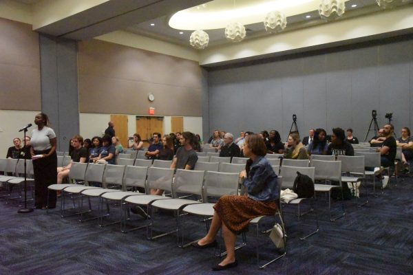 Audience members ask questions about the Supreme Court discussion. 