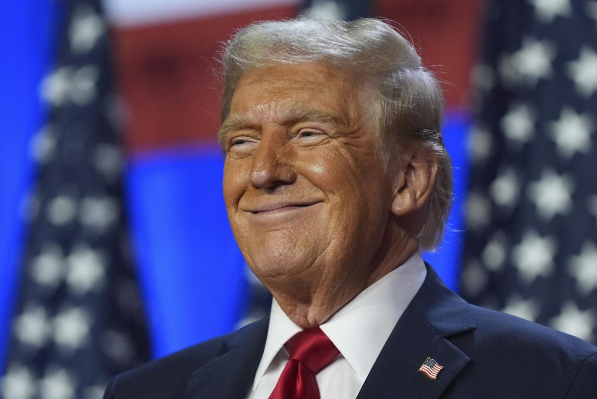 Republican presidential nominee former President Donald Trump smiles at an election night watch party at the Palm Beach Convention Center, Wednesday, Nov. 6, 2024, in West Palm Beach, Fla. (AP Photo/Evan Vucci)