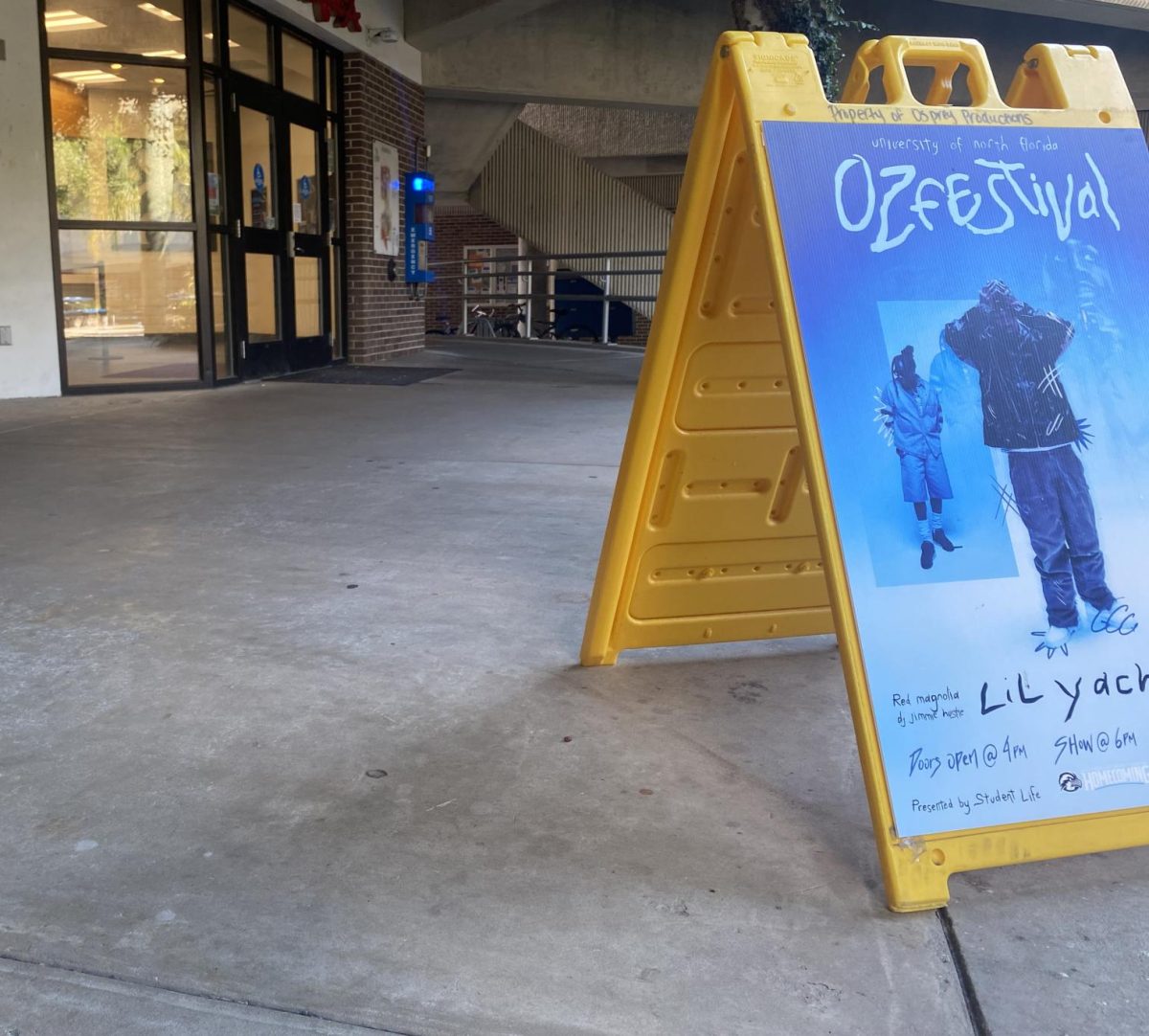 An OzFestival sign outside the UNF Chick-fil-A. 