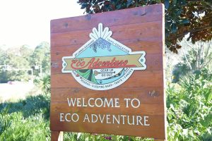 The Eco-Adventure sign outside outside of the nature trails. The sign reads "Welcome to Eco Adventure"