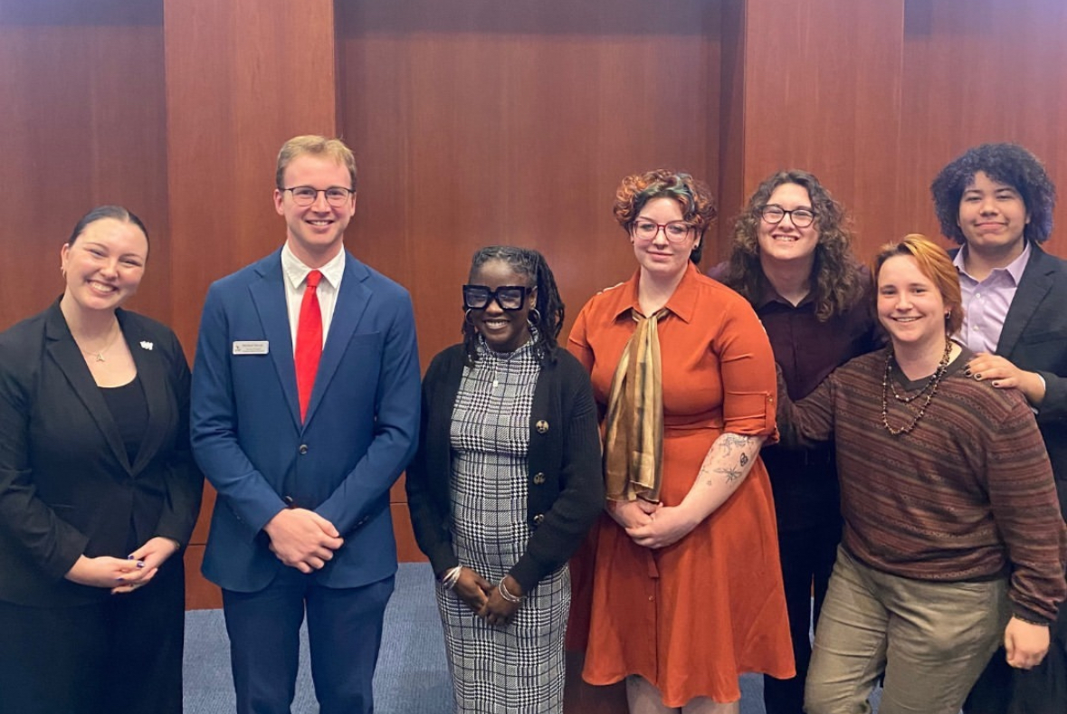 Representatives from BSU and Pride Club, including Pride Club President Aster Walters (back right), pose for a picture with UNF Student Body President Michael Barcal and Student Body Vice President Ashlyn Davidson. (Courtesy of UNF SG)