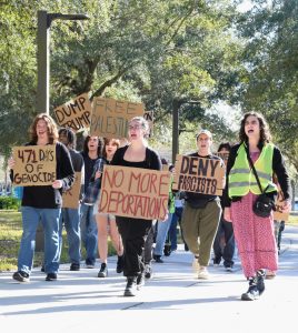 UNF SDS protestors march from the library to the Brooks College of Health on Jan. 29, 2025. 