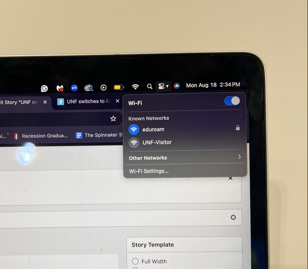 The top right corner of a laptop screen, displaying a Wi-Fi panel.