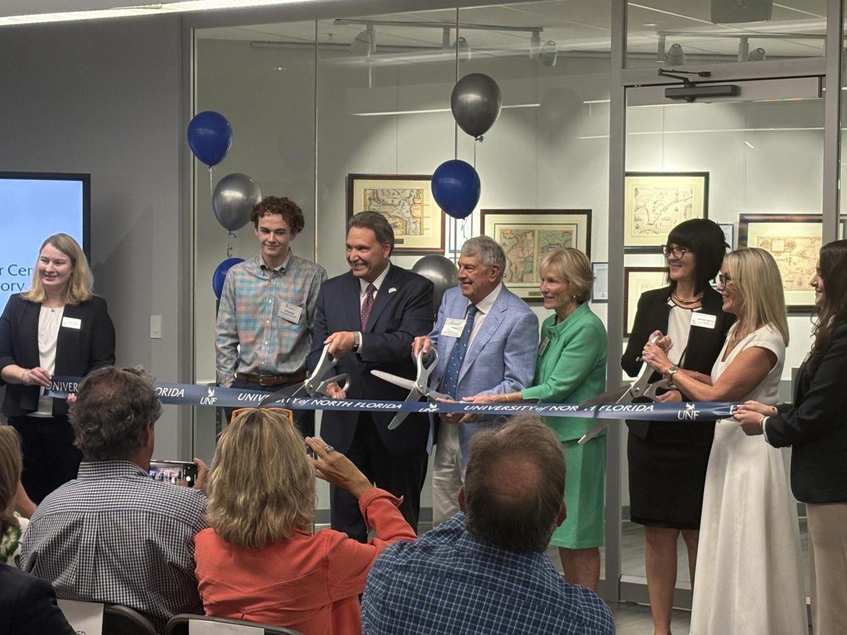 The Lastinger family and UNF President Limayem joined university library staff and community members on Friday to celebrate the new center.
