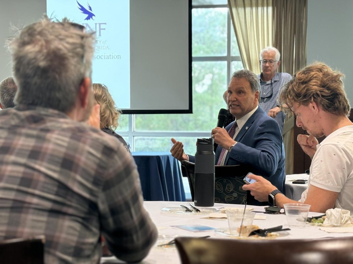 President Moez Limayem answers questions at a Faculty Association meeting on Oct. 2—two days after the announcement that he was the sole finalist for the USF presidency.