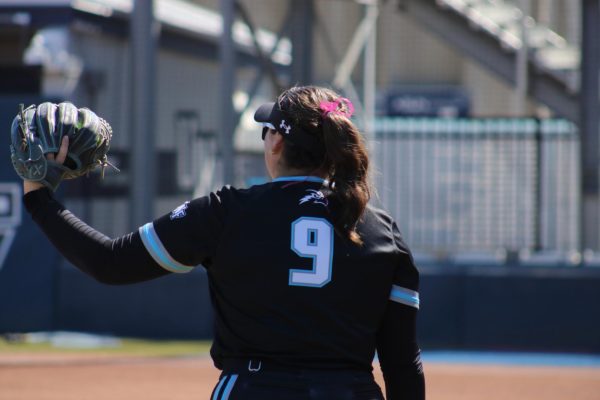 Softball player number 9.