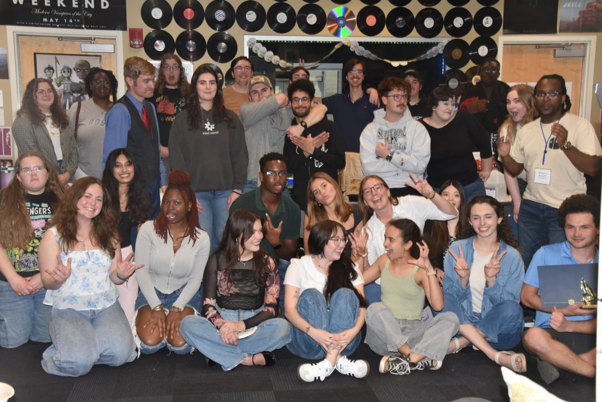 Group of students pose for a group photo.
