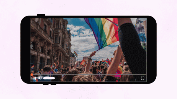 Graphic of cell phone with a Pride Parade photo displayed on the screen.